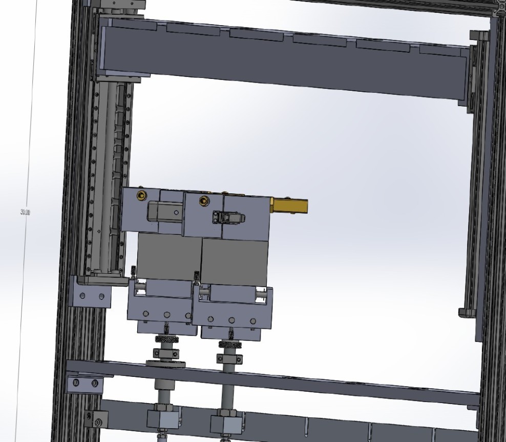 A SolidWorks model of a complex automated mechanical system.