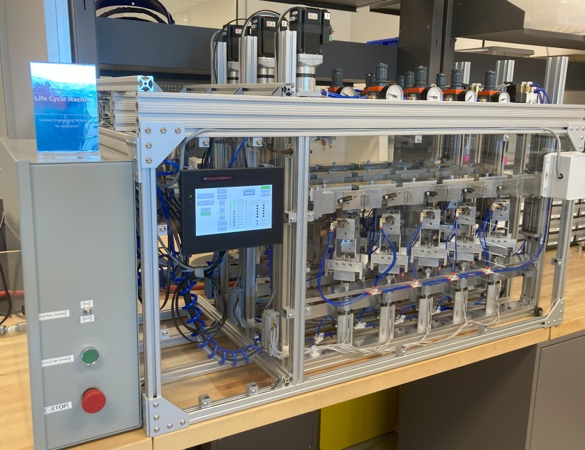 An automated life cycle test machine for evaluating duability and reliability of medical devices.